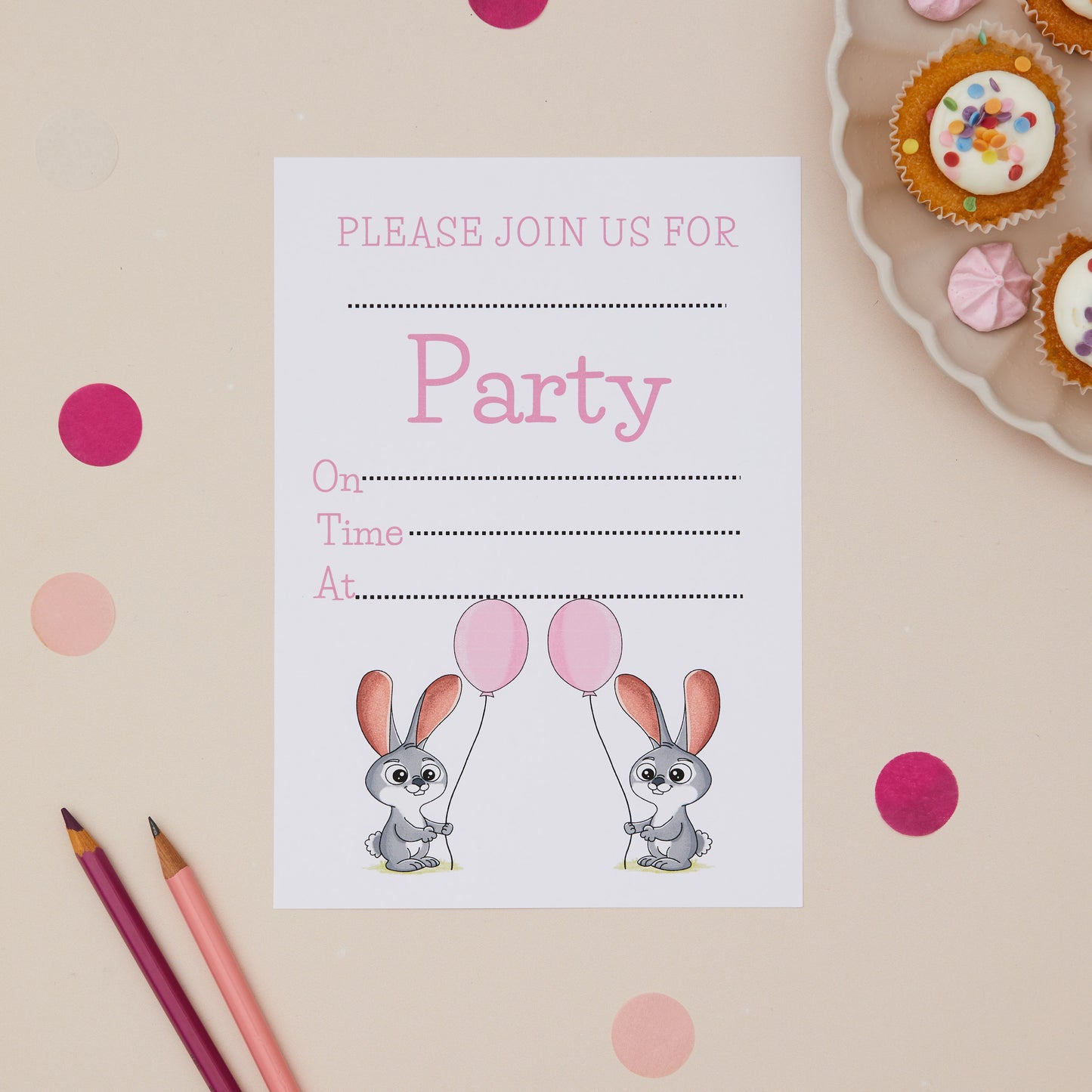 Bunny Rabbit Children ready to write birthday invites. Party invitation card with cartoon bunnies and balloons on a beige background with cupcakes and polka dots.