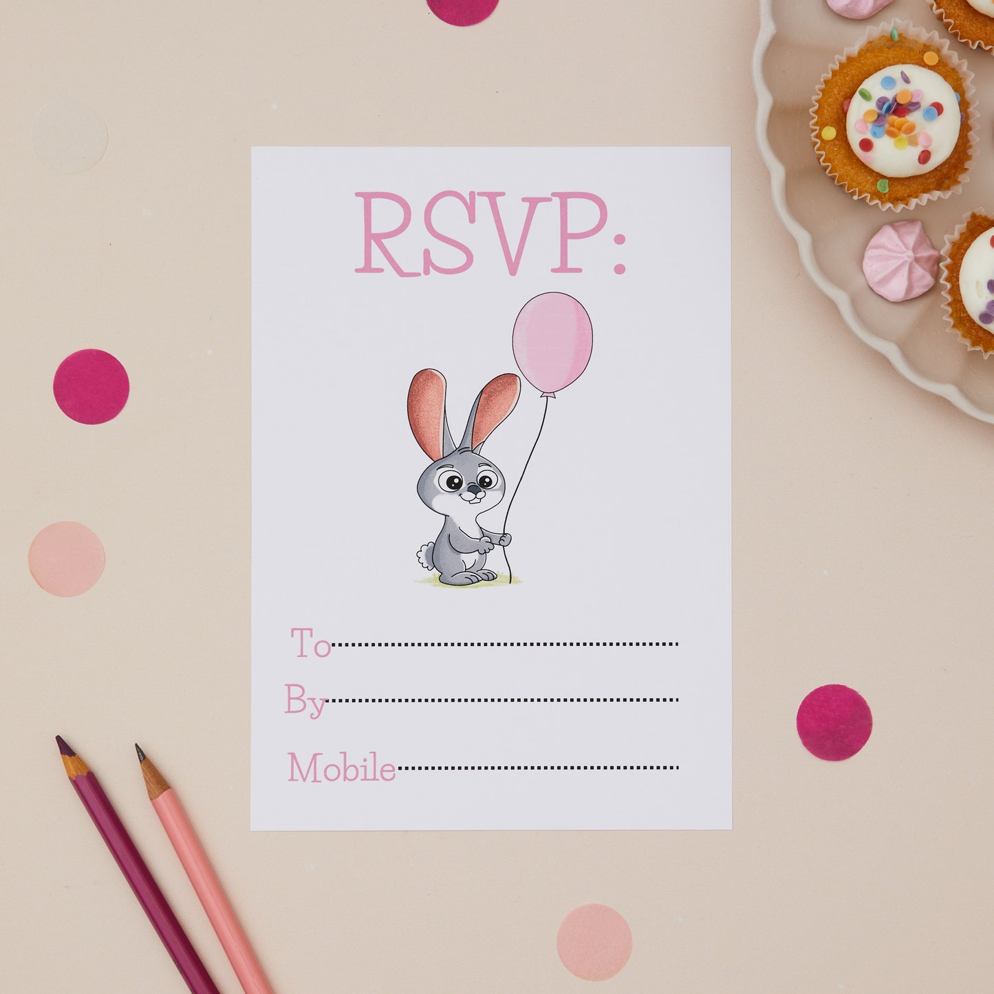 Bunny Rabbit Children ready to write birthday invites RSVP. RSVP card with a cartoon rabbit holding a pink balloon on a beige background with polka dots and cupcakes.