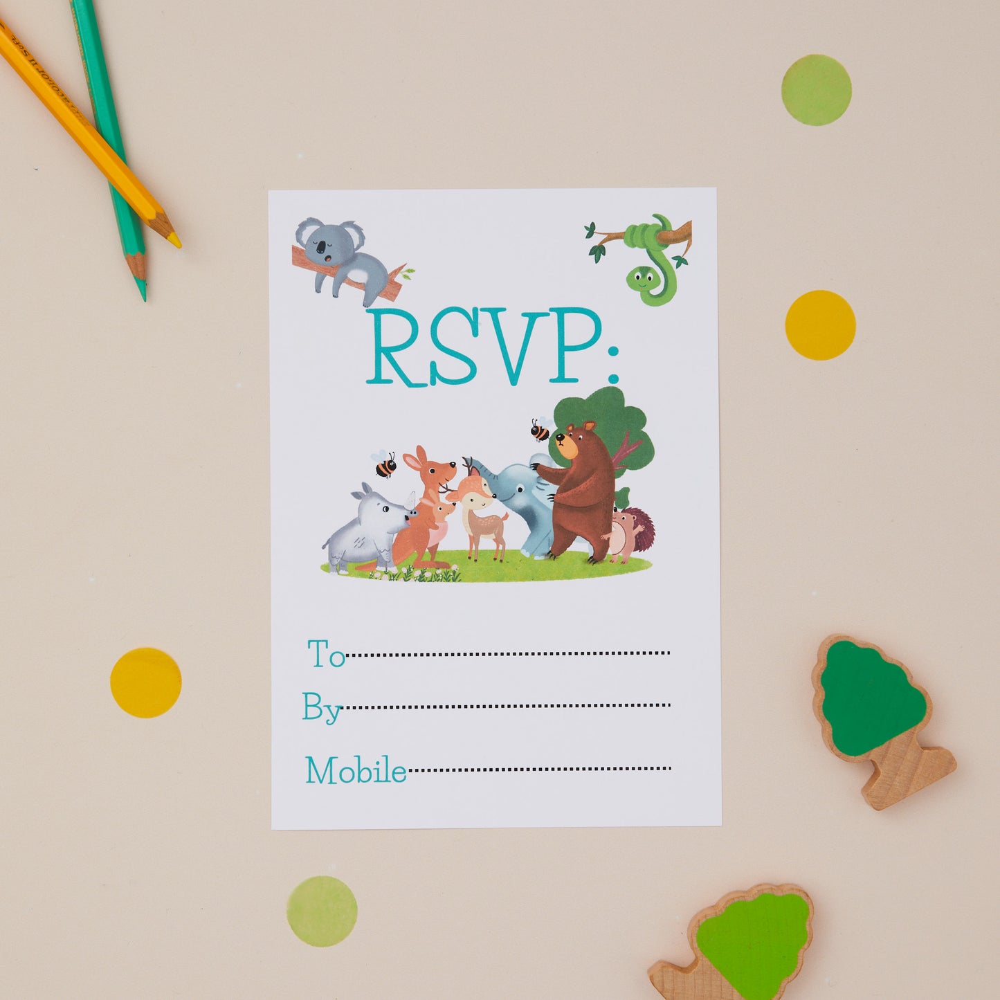 Kids Woodland Birthday Party Invite RSVP card with animal illustrations on a beige background with colored pencils and mini toy trees.