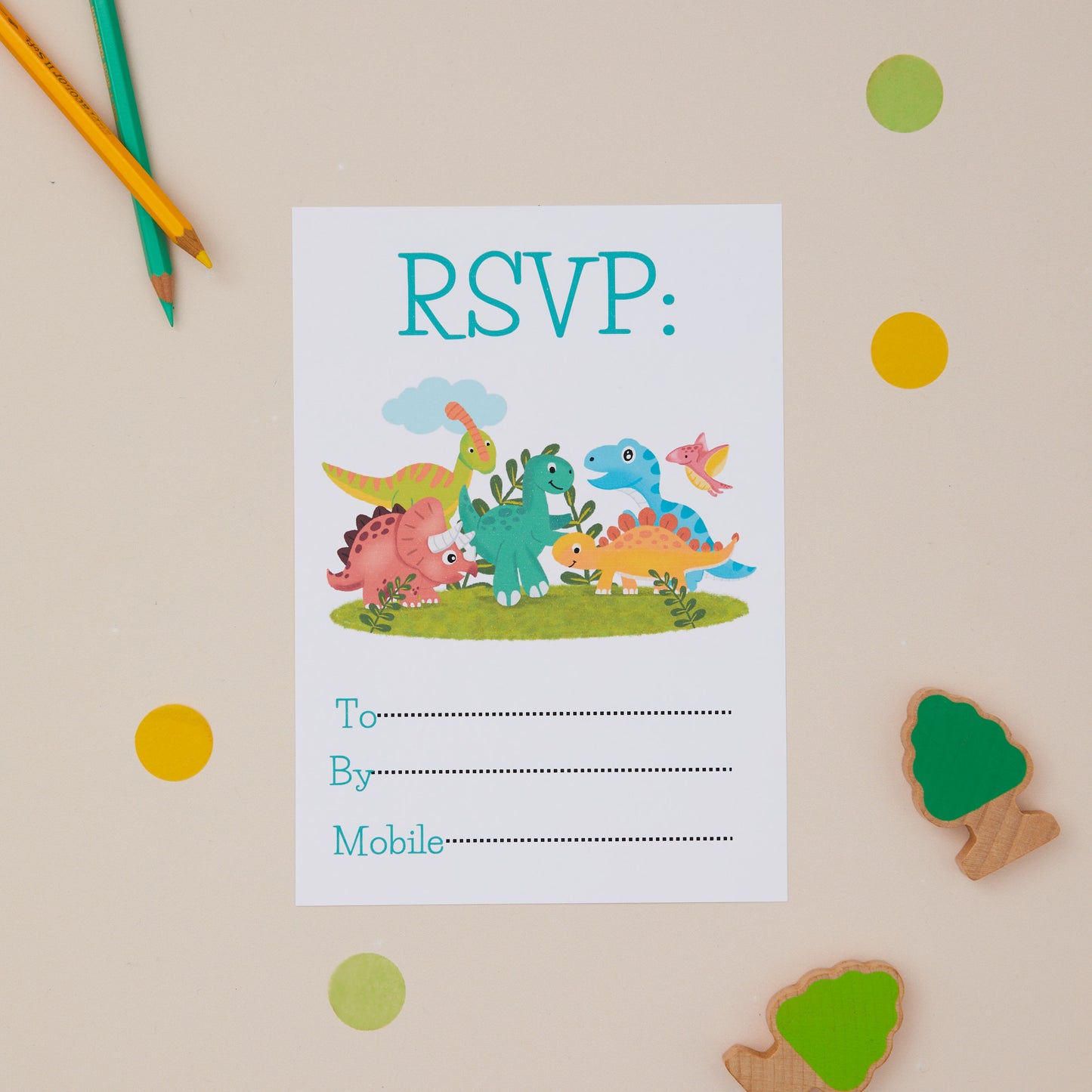 Kids birthday party baby dinosaur invitation card featuring cartoon baby dinosaurs having a party at the bottom of the page. At the top it says the words "RSVP" and reply details are the bottom.