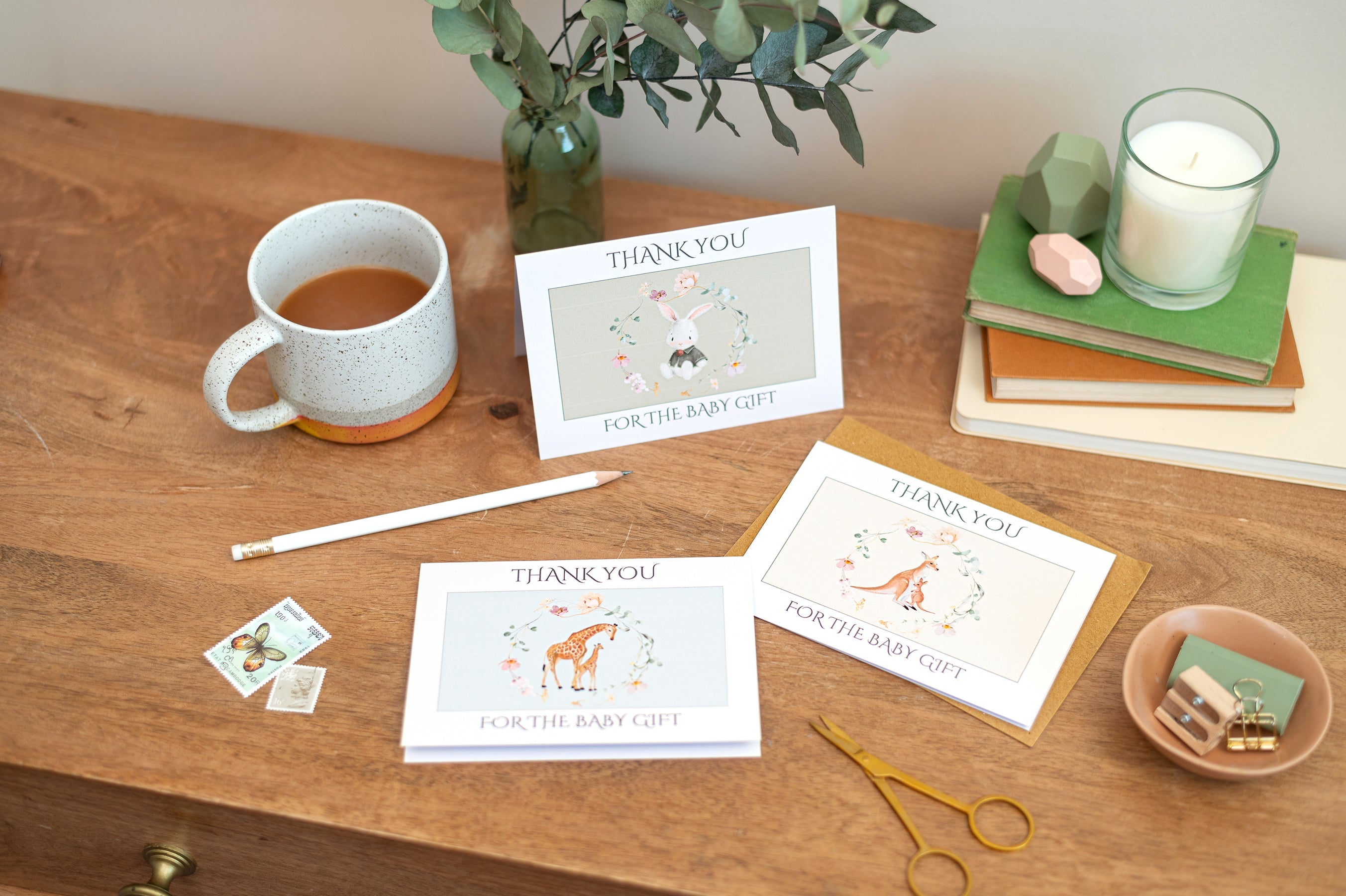 Baby Shower And Baby Gift Thank You Cards, set on a table with stationery