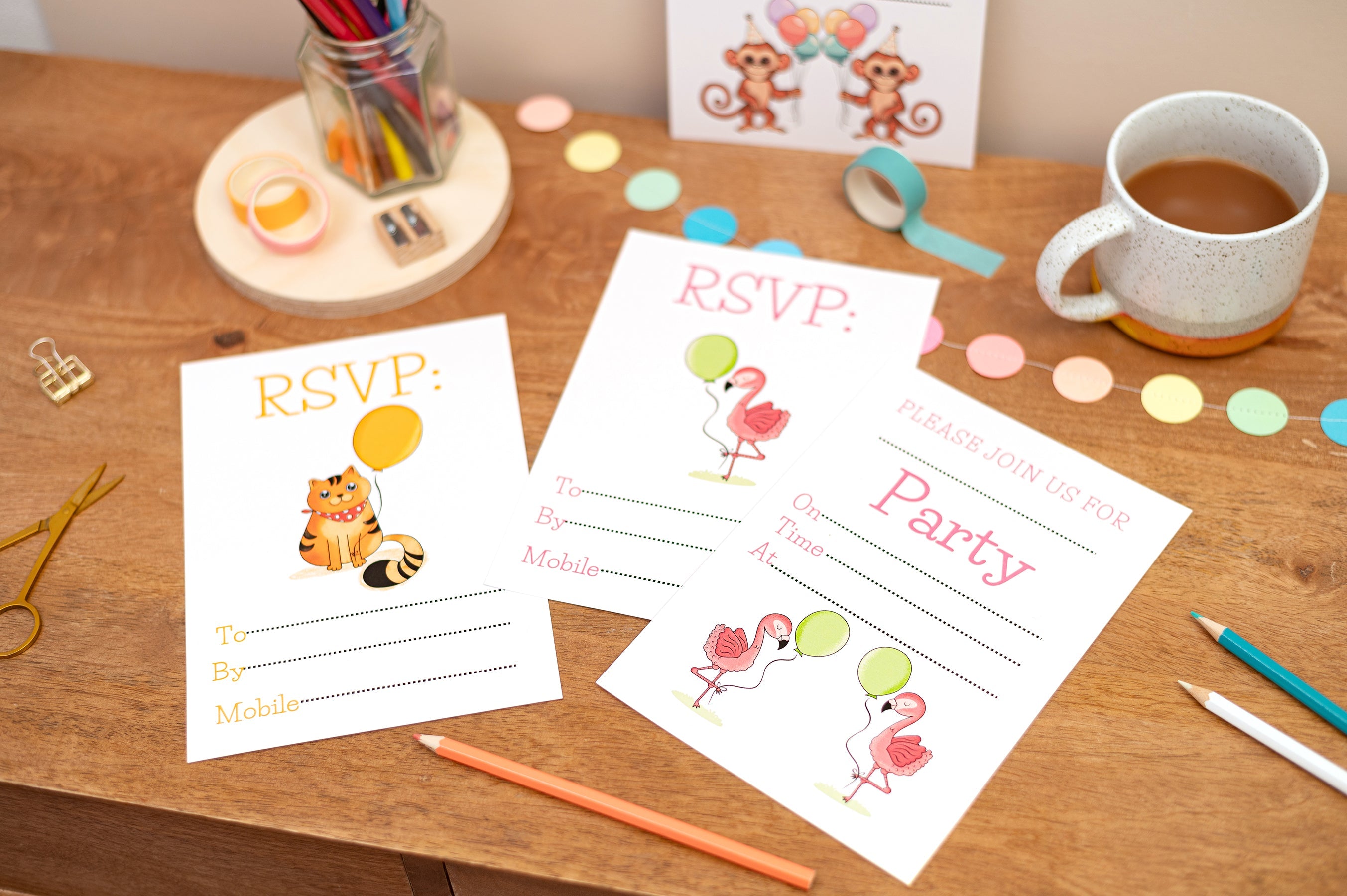 Kids Birthday Party Invitations. Group of 4 Kids Birthday Party Invitations featuring Party Cat, Party Monkeys and Pink Party Flamingos with Balloons. They are on a table with tea and stationery items