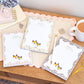 A5 Daily Planners featuring 3 different designs all showing our signature cartoon foxes. Planners are on a wooden desk with a cup of tea.