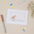 Greeting card featuring a giraffe and it&