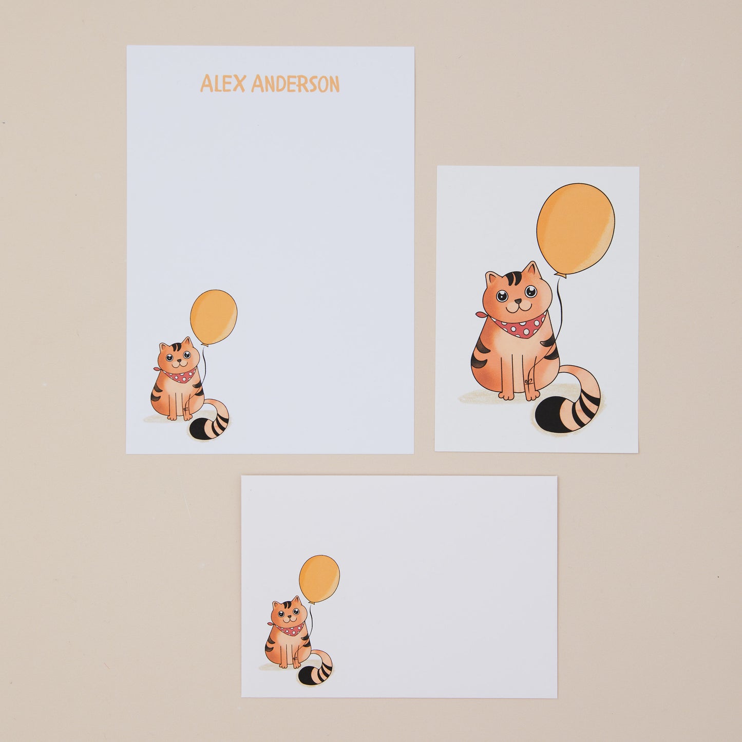 Three Letter Writing items for kids featuring a cat with a balloon on a beige background