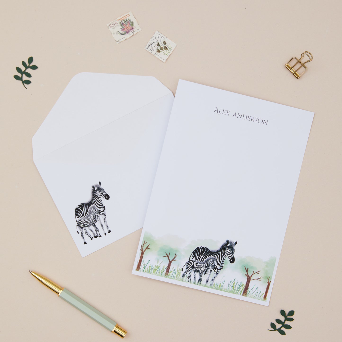 Zebra Letter Writing Set with zebra design and matching envelope on a beige background