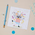 Kids Party Mouse Birthday Card with an illustration of a party-themed mouse, accompanied by party streamers, confetti, a pencil.