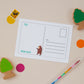 Kids_Postcard_Set__Woodland_Themed. The illustration is showing the back of the postcard which features a woodland bear, and an area to include the address of the recipient