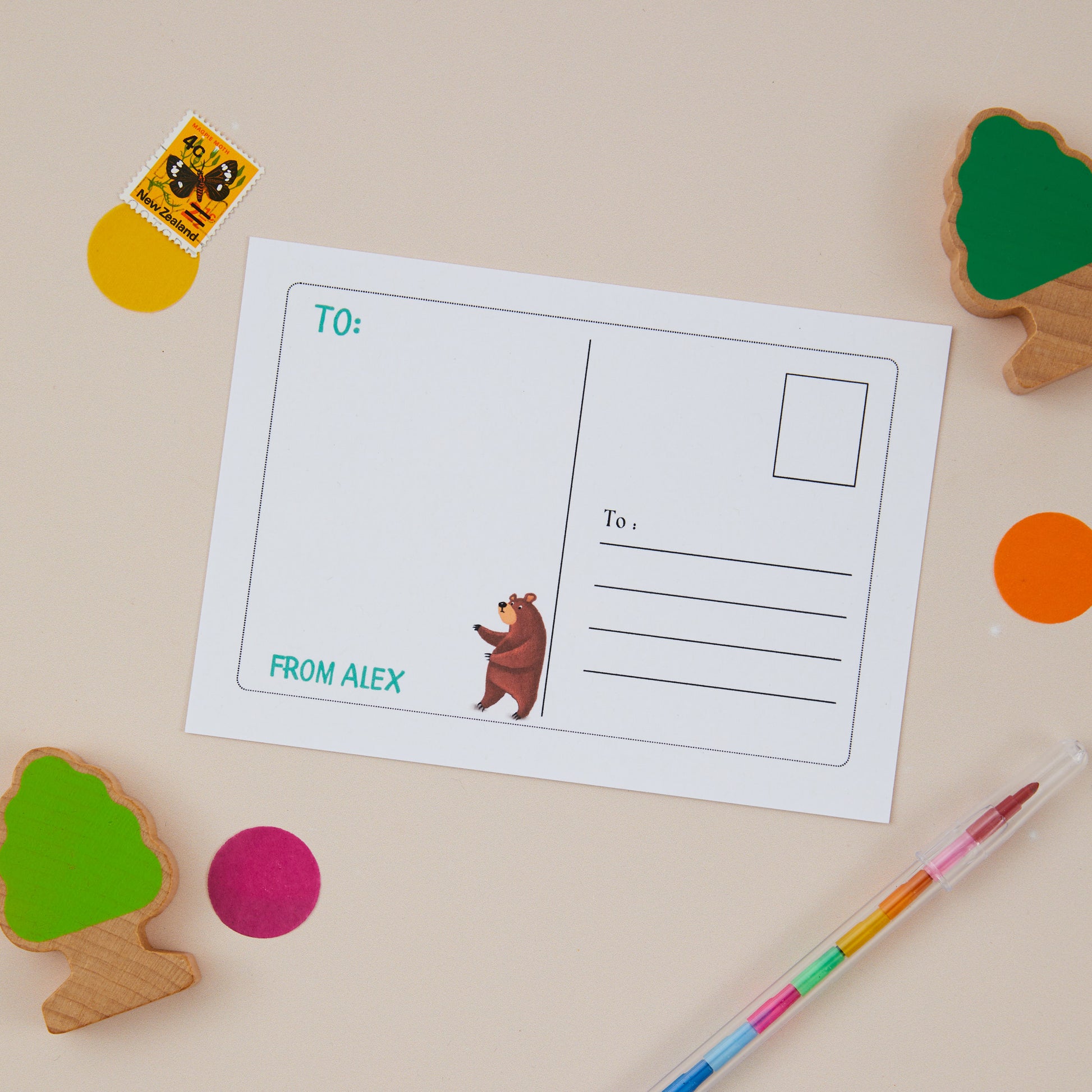 Kids_Postcard_Set__Woodland_Themed. The illustration is showing the back of the postcard which features a woodland bear, and an area to include the address of the recipient
