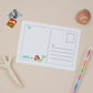 Kids Mermaid Postcard Set. Illustration of the back of postcard  with mermaid illustrations, and the right hand side of the postcard has an area for writing the recipients address