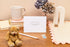 Letterpress Happy Baby Shower Card in white with silver font which says happy baby shower, can&