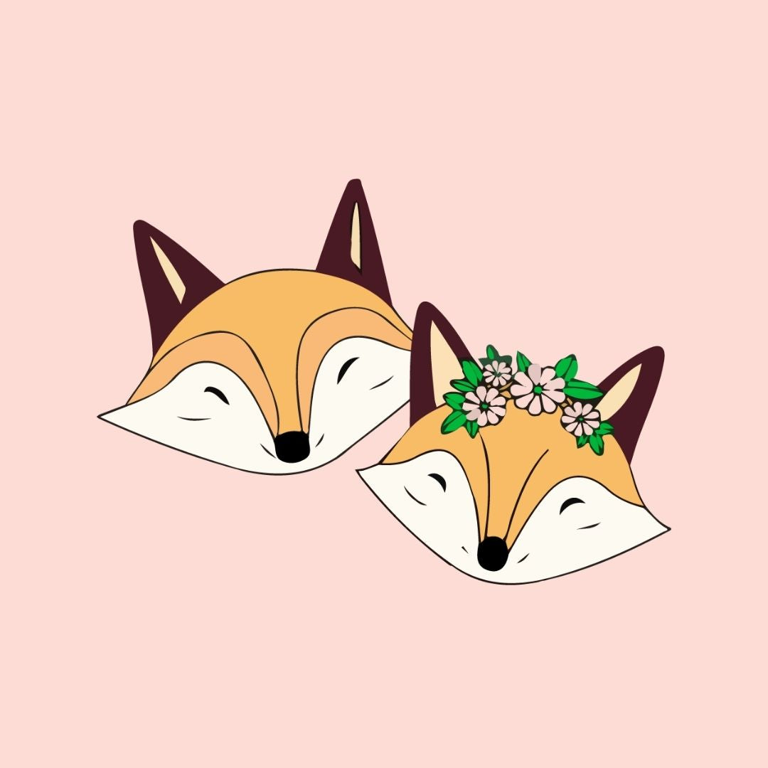 Logo design for Sjstationery of two fox faces with one wearing a floral headband on a pink background