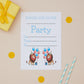 Party Lions Childrens ready to write birthday invites. Party invitation card with cartoon lions and balloons on a beige background with a gift and straws.