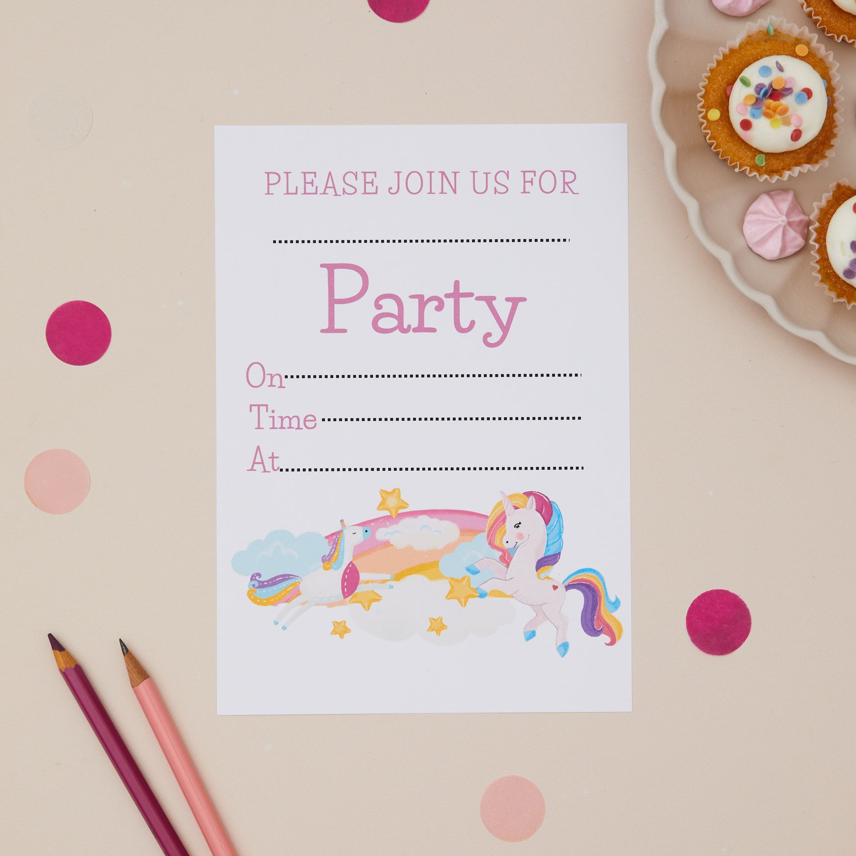 Party Unicorns Childrens ready to write birthday invites.Party invitation card with a unicorn design on a beige background with polka dots and cupcakes.