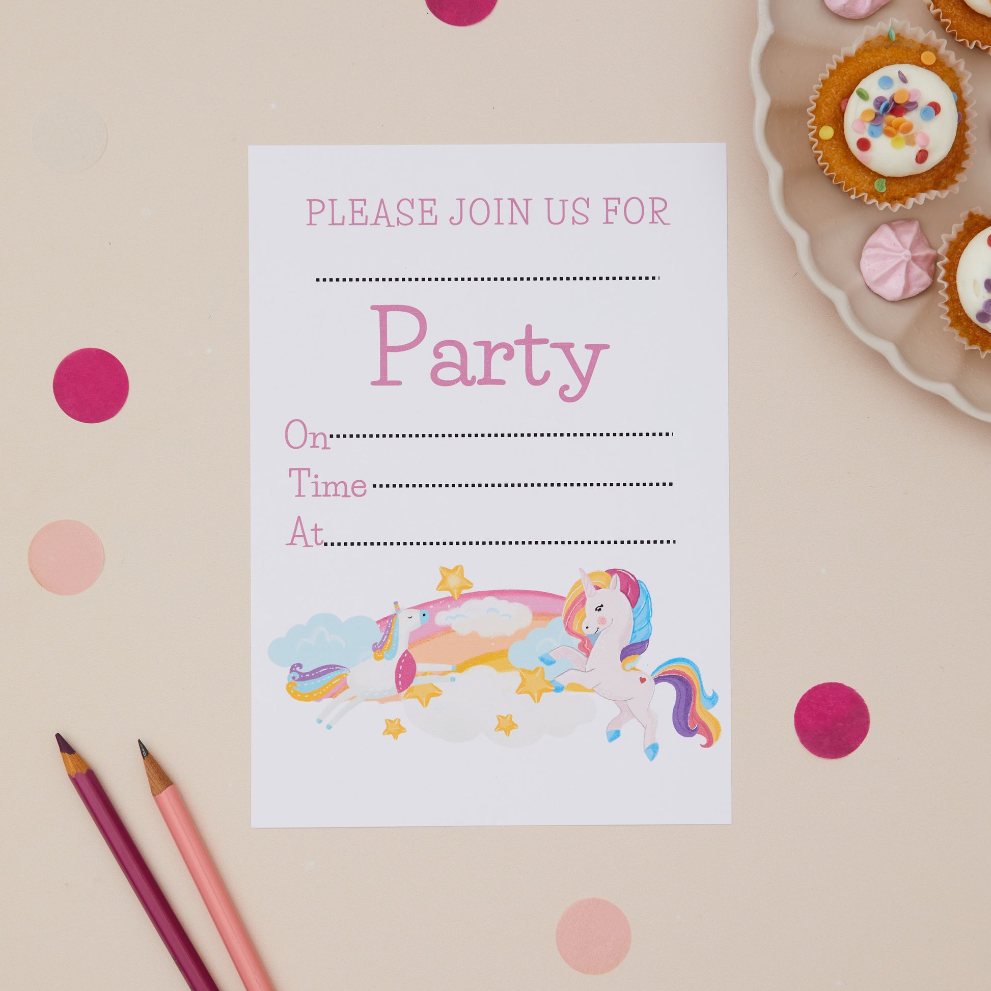 Party Unicorns Childrens ready to write birthday invites.Party invitation card with a unicorn design on a beige background with polka dots and cupcakes.