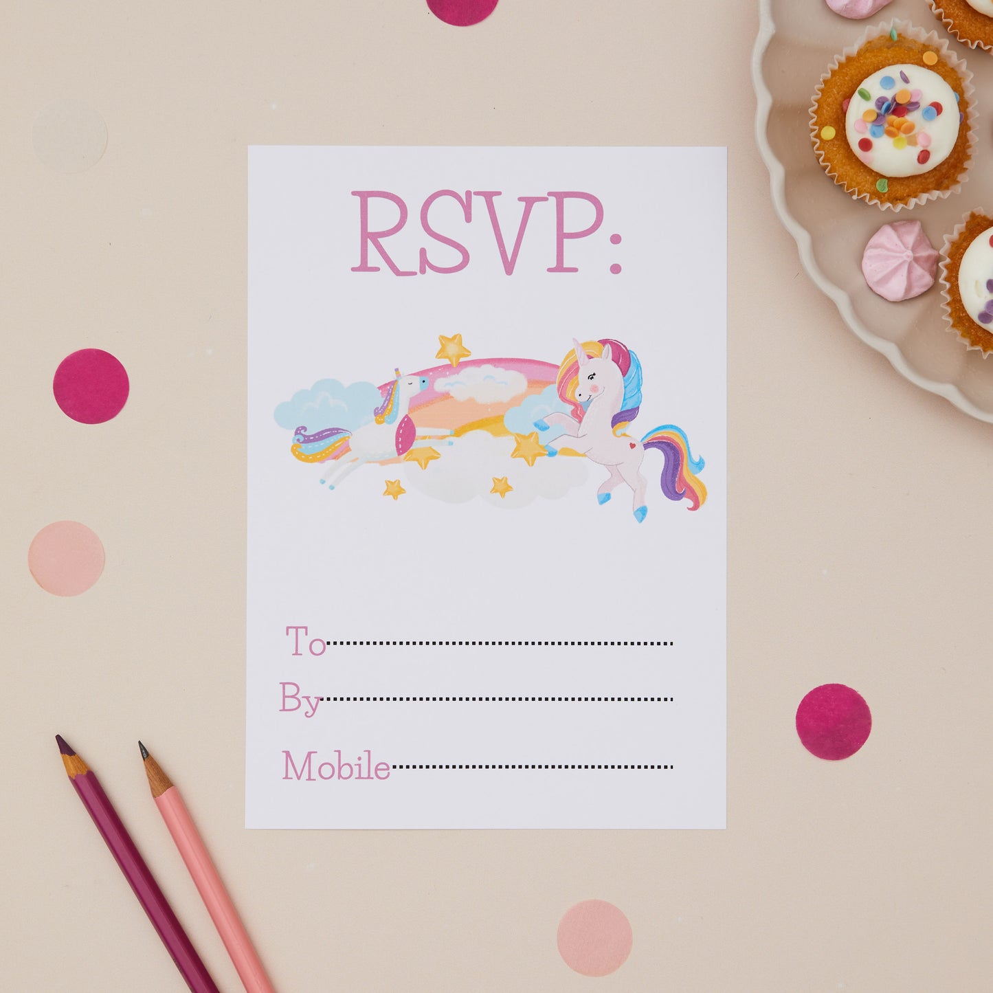 Party Unicorns Childrens ready to write birthday invites  RSVP. Unicorn-themed RSVP card with cupcakes and pencils on a beige background
