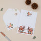 Personalised Deer Letter Writing Set with matching envelopes set against a beige background with woodland element decorations