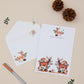 Personalised Deer Letter Writing Set with matching envelopes set against a beige background with woodland element decorations and stationery