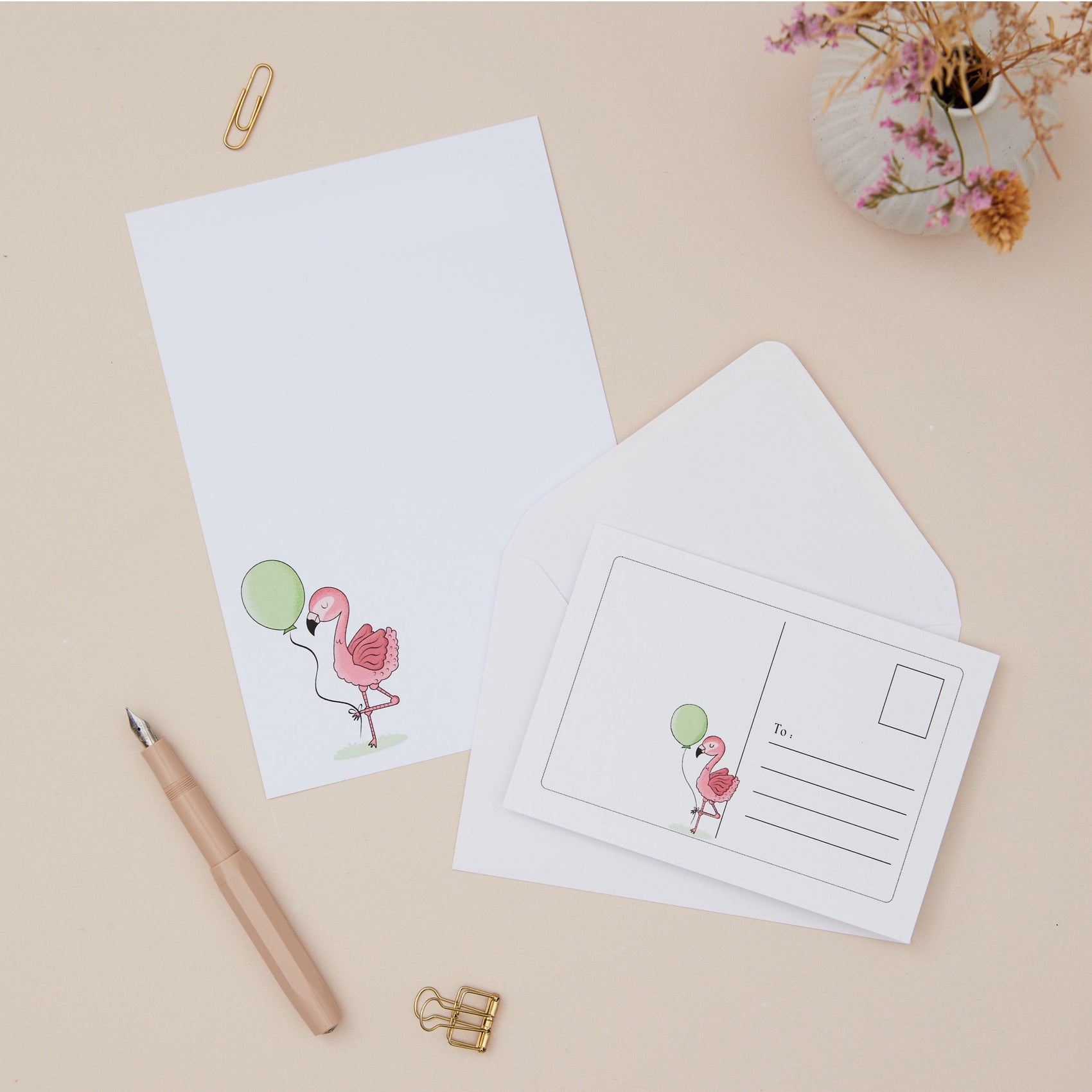 Pink Flamingos Letter Writing Set with Postcards. Flamingo postcard and writing paper with envelope on a beige background