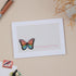 A sympathy greeting card with a colourful butterfly design on the front, with the text &